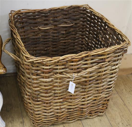 A large wicker laundry or log basket, W.65cm